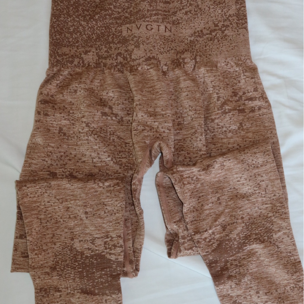 NVGTN pixel brown leggings 
Barely worn size small